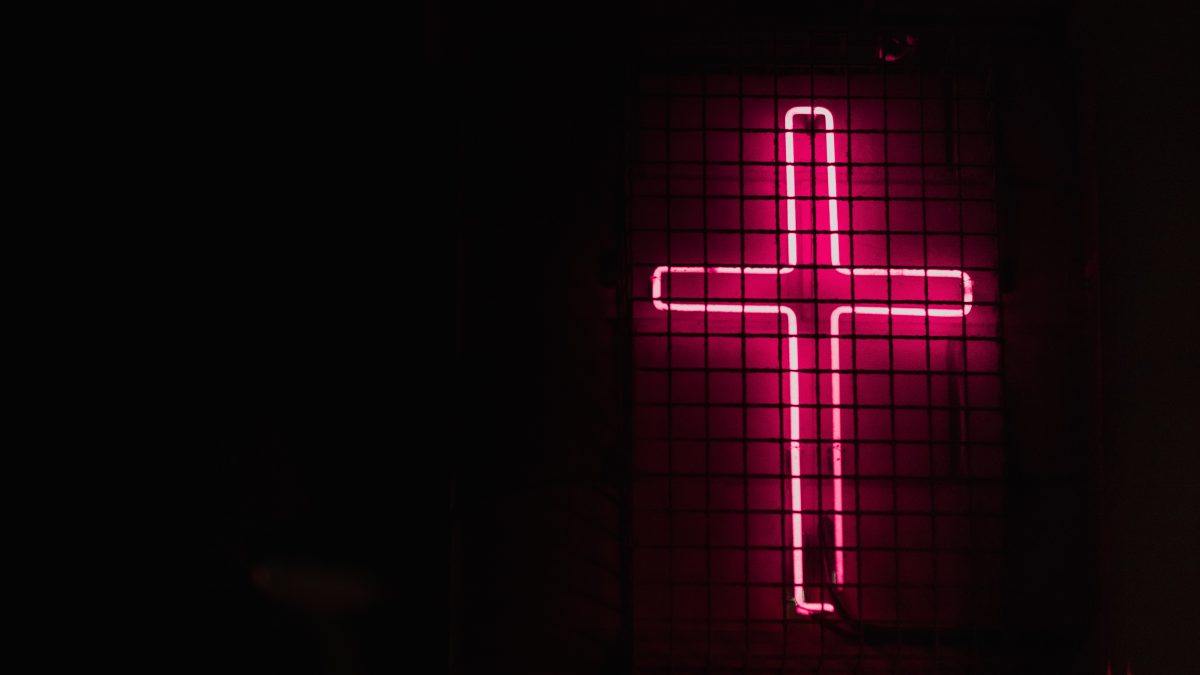 pink cross neon signage