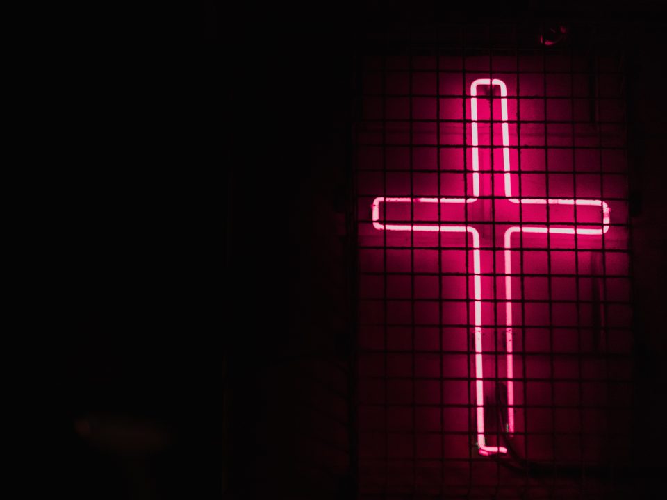 pink cross neon signage