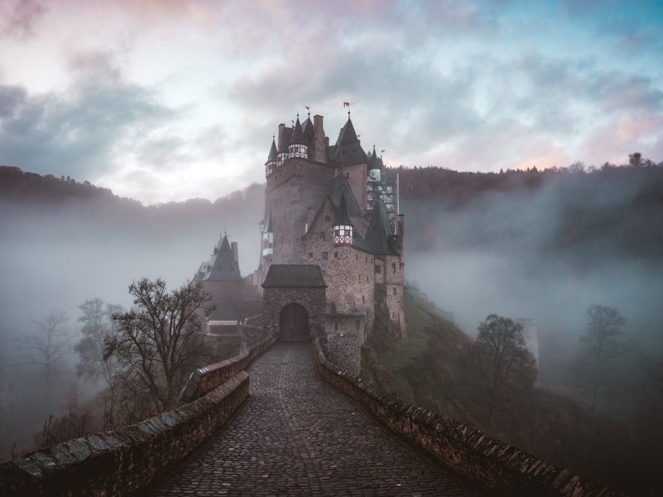 closeup photo of castle with mist