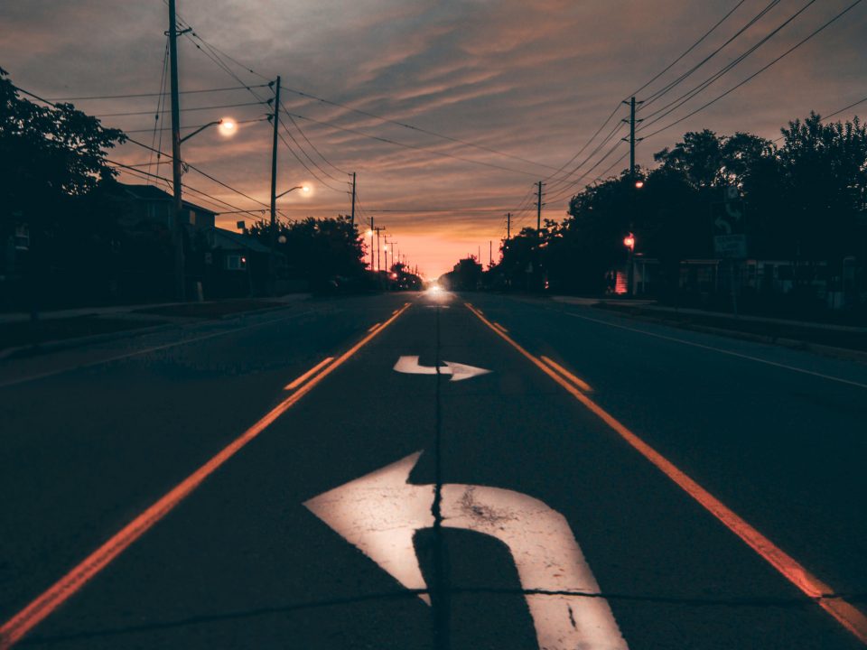 highway near trees during golden hour