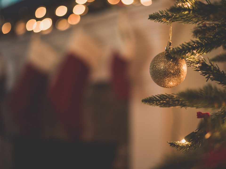 closeup photo of baubles on christmas tree