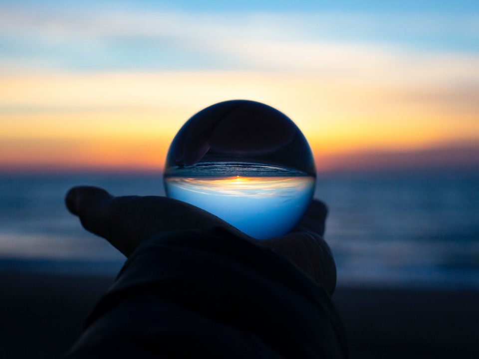 person holding clear glass glass