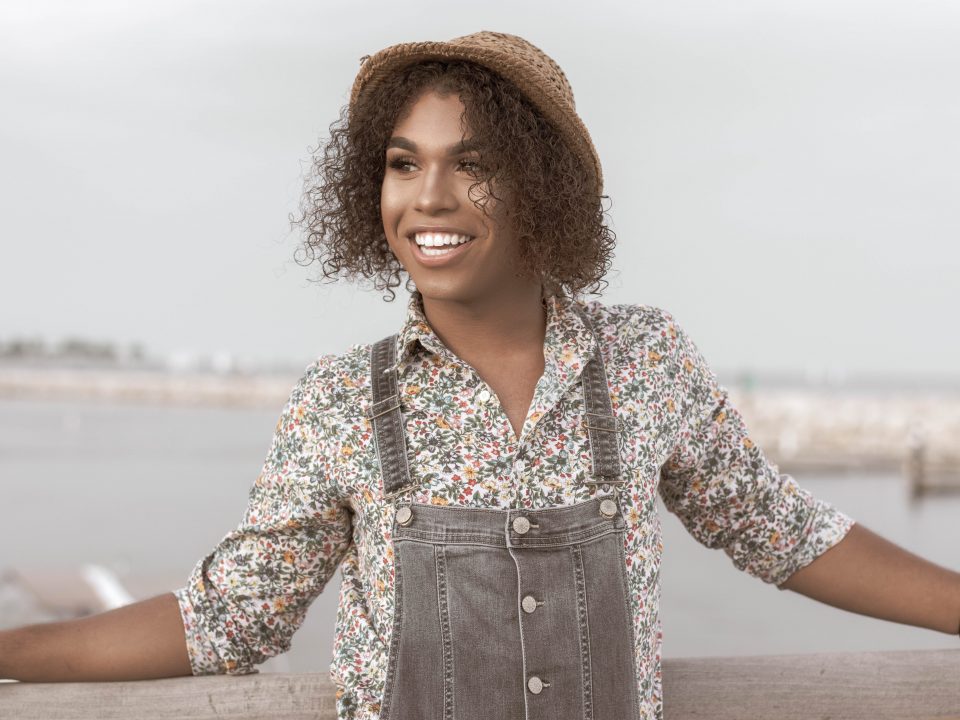 woman in gray overalls