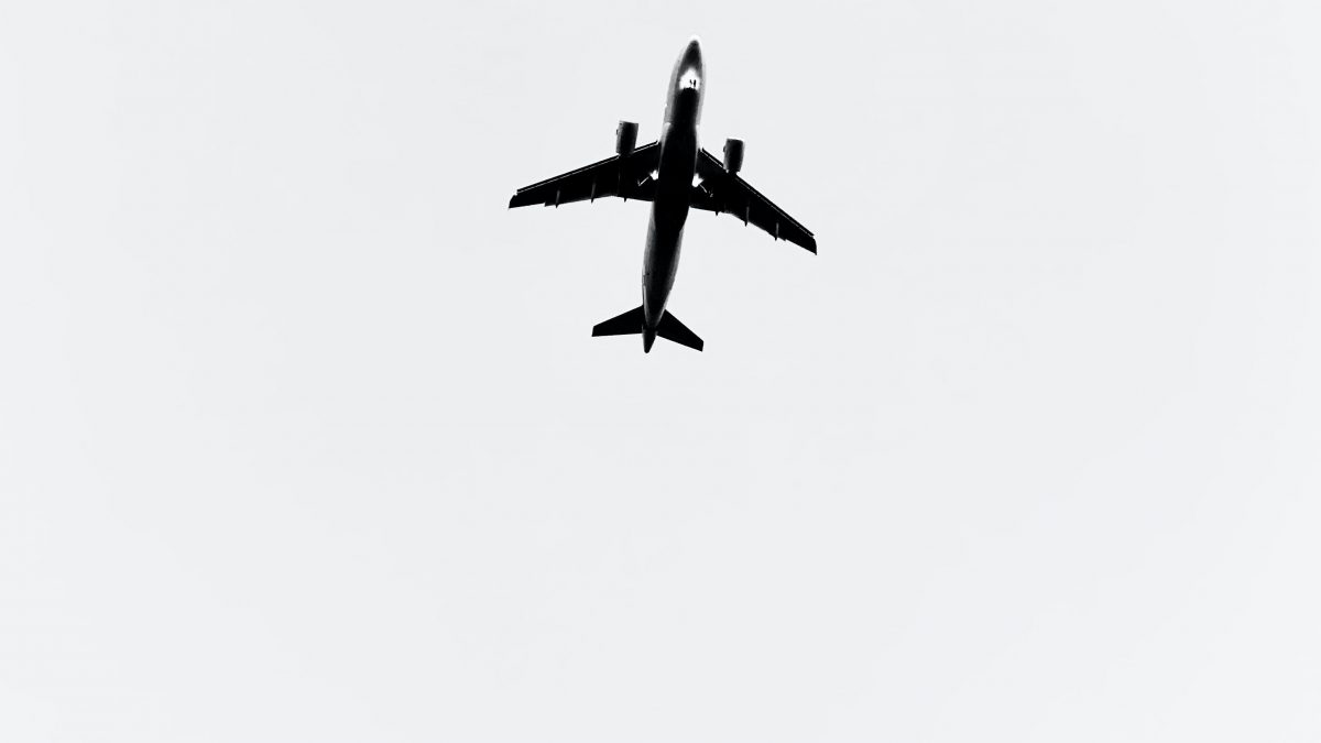 black airplane in mid air