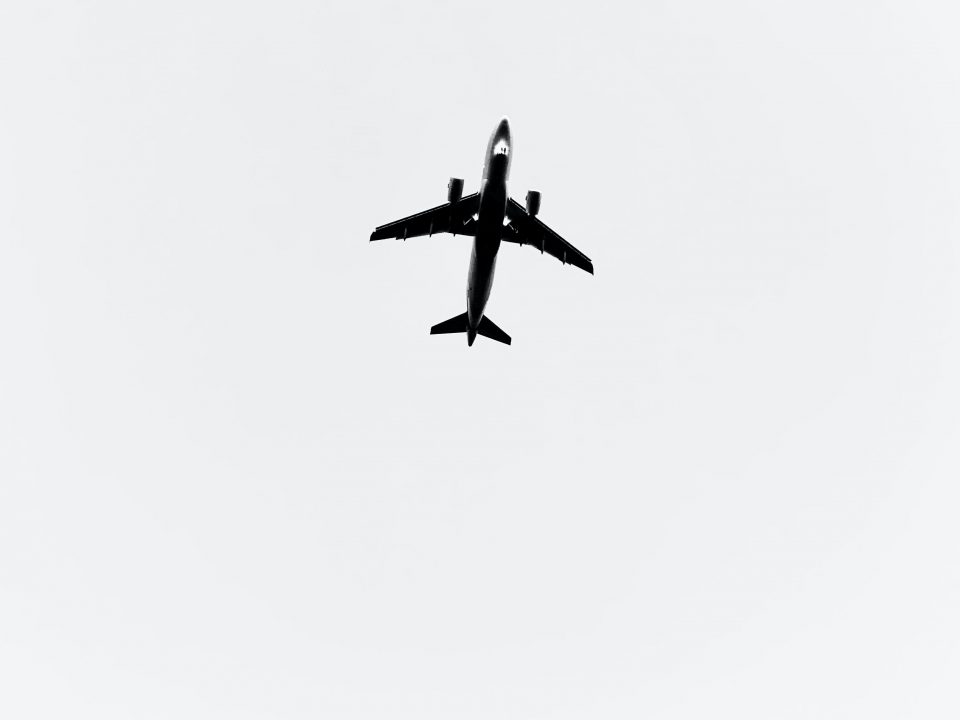 black airplane in mid air