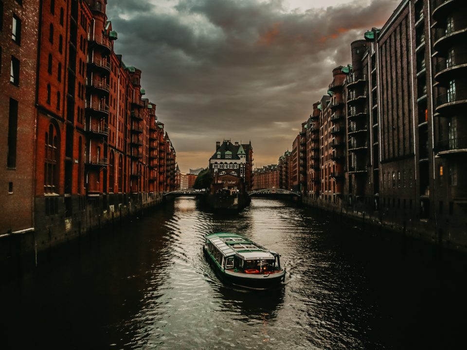 white boat on body of water