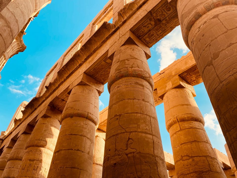 brown concrete pillars under blue sky during daytime