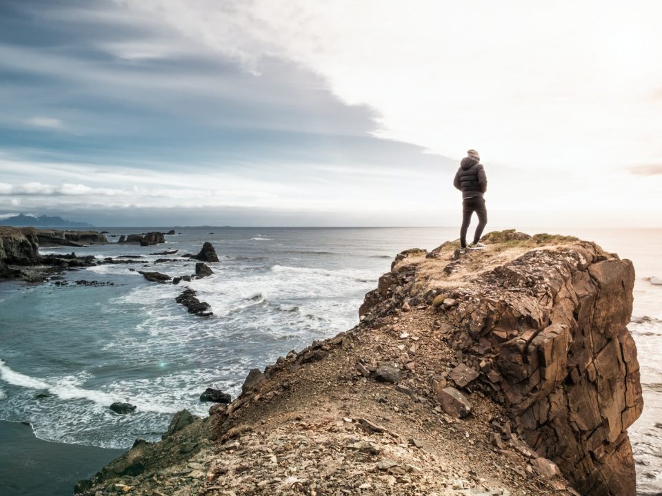 man on edge of cliff