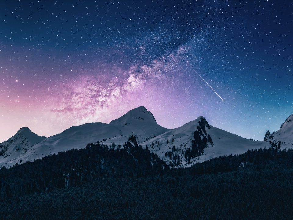 snow mountain under stars