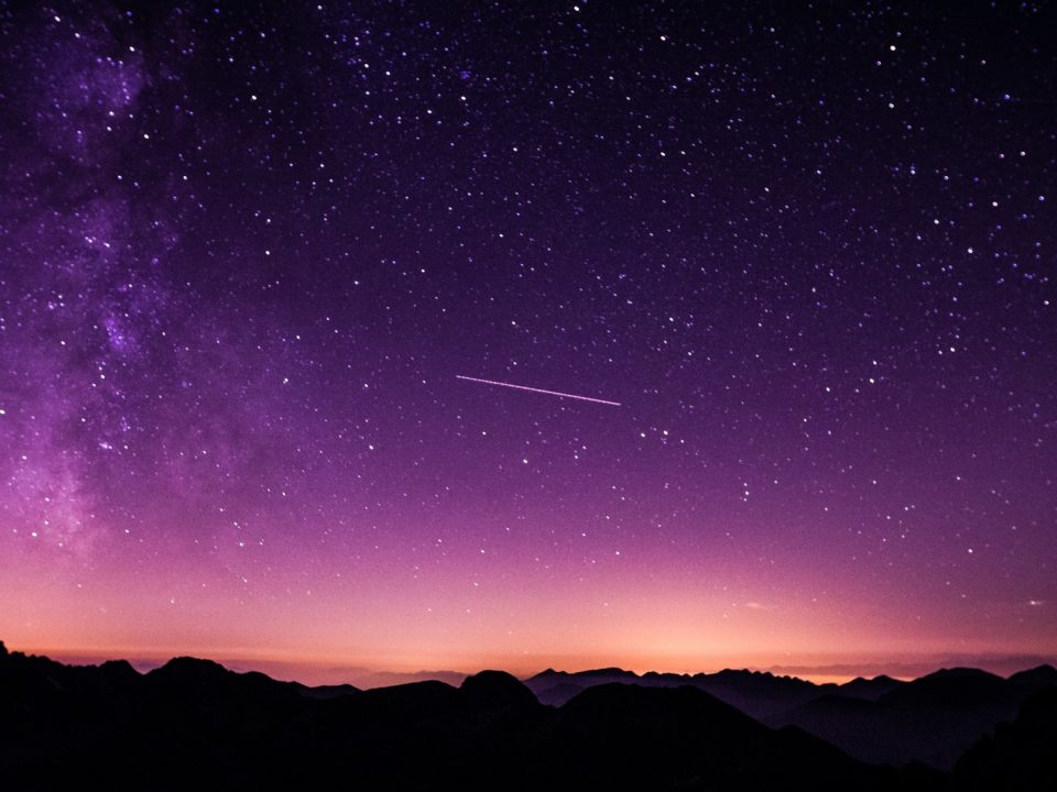 silhouette photo of mountain during night time