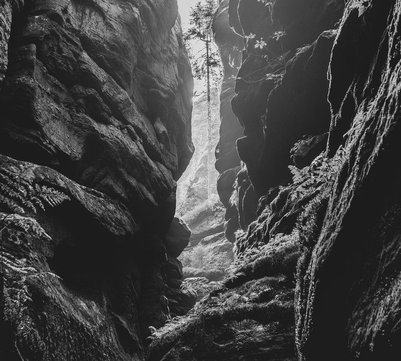 grayscale photo of rocky mountain