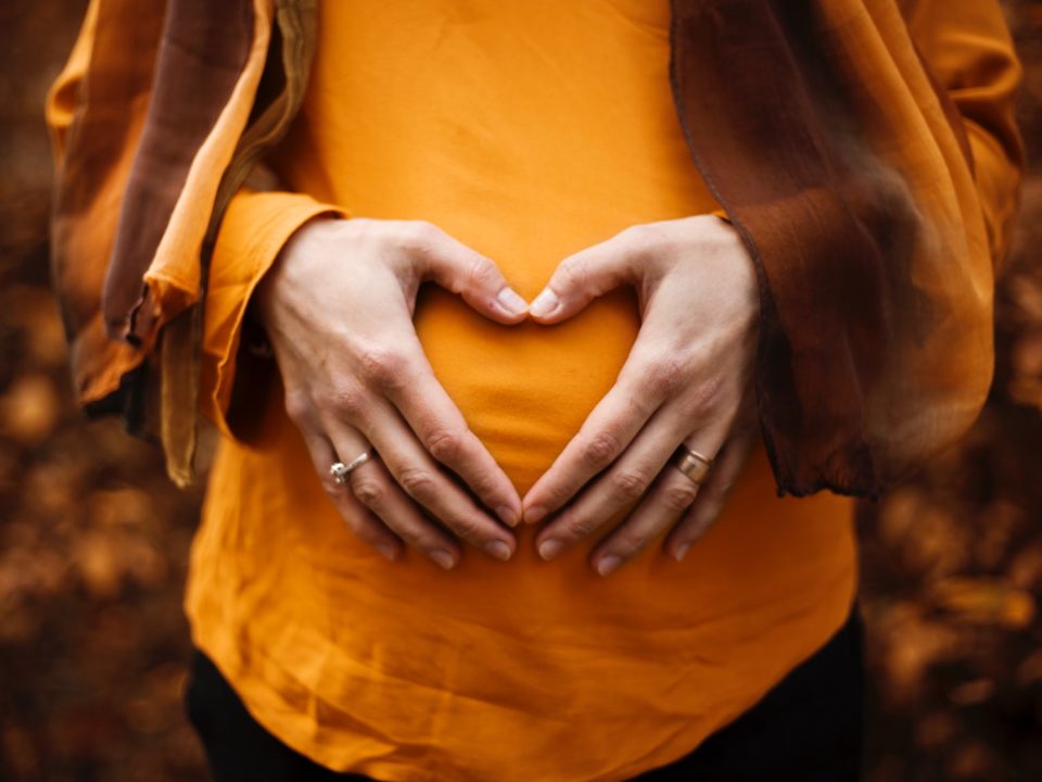 person touching stomach