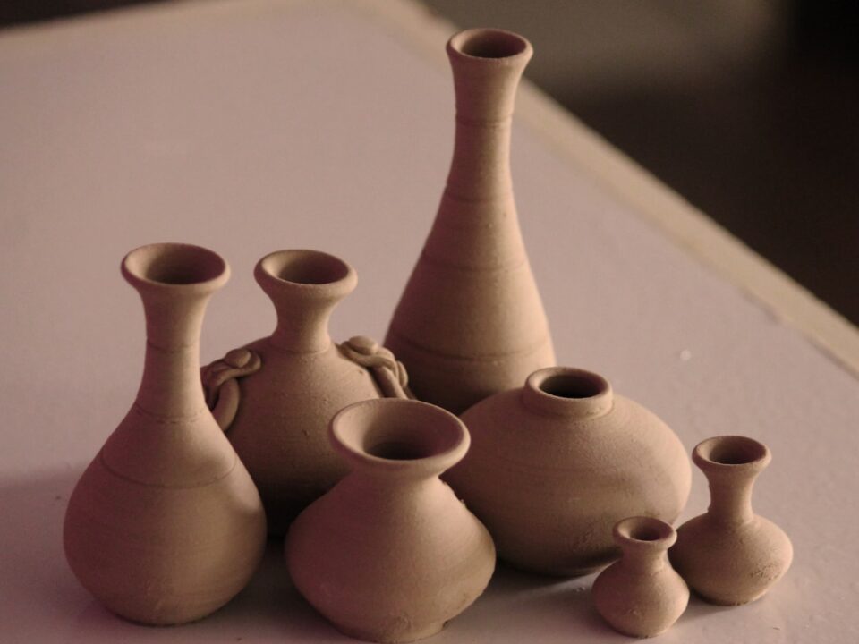 white clay vases on table