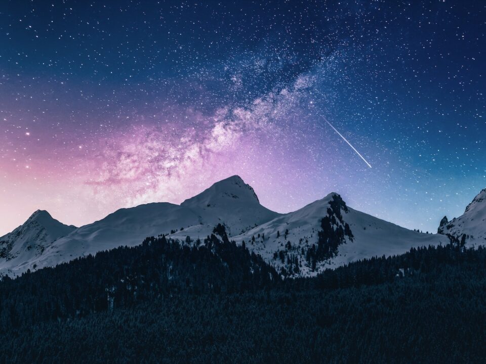 snow mountain under stars