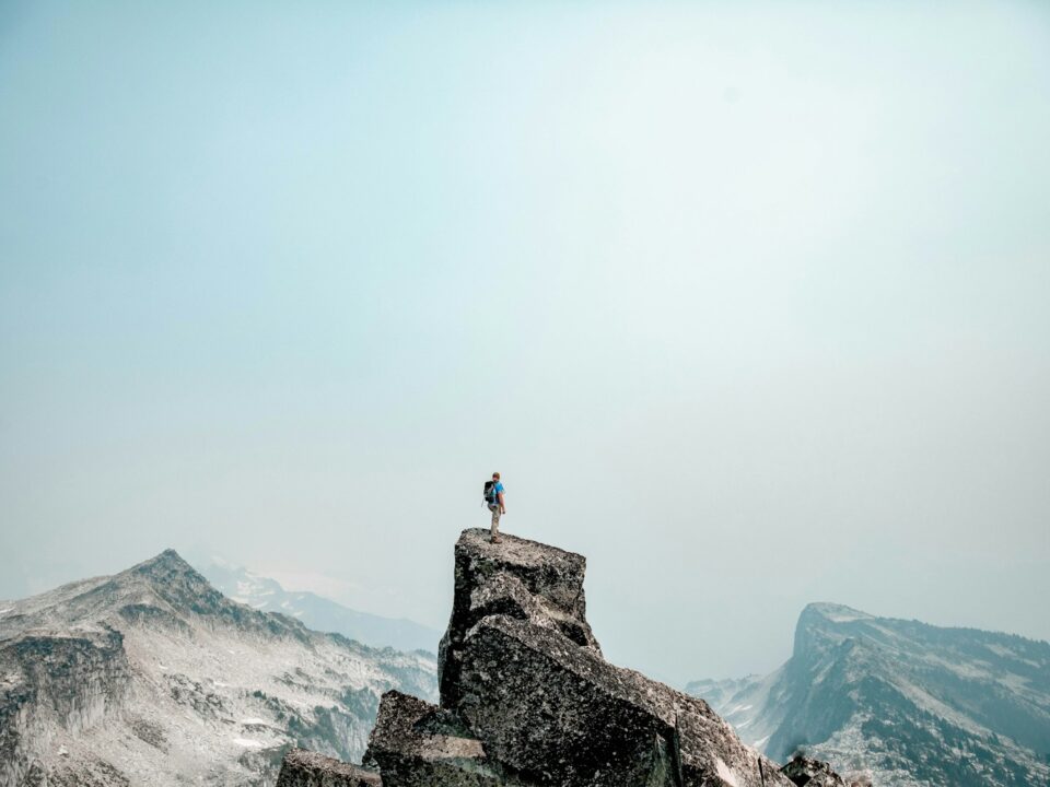 a person standing on top of a mountain