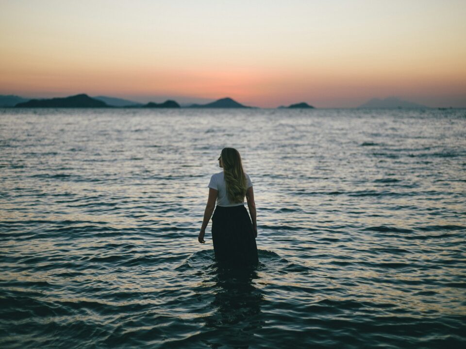 woman walking on body of water