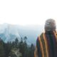 woman facing the mountains at daytime