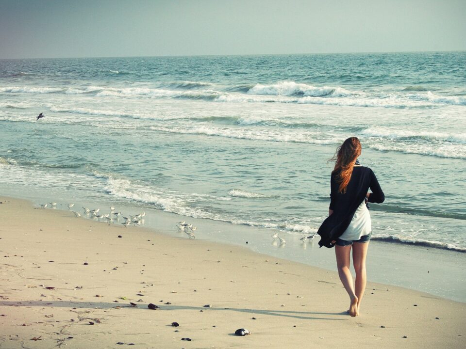 woman standing at seashore