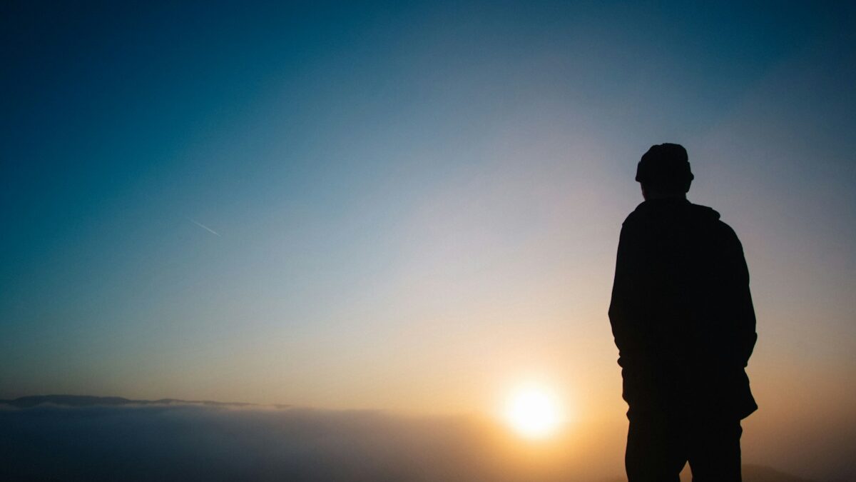 silhouette of a person during sunset