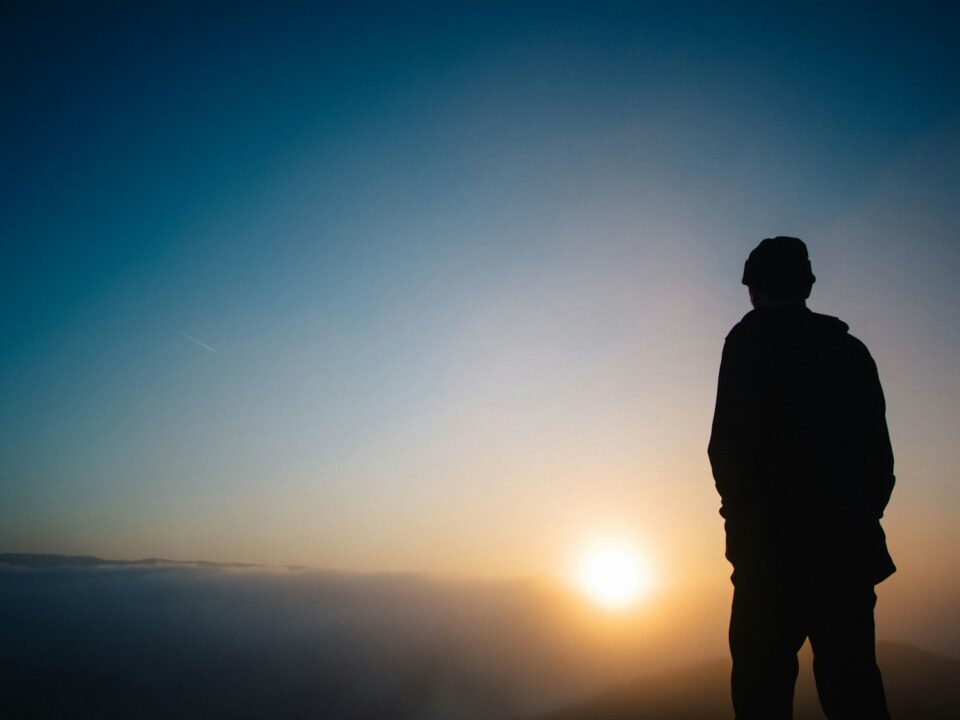 silhouette of a person during sunset