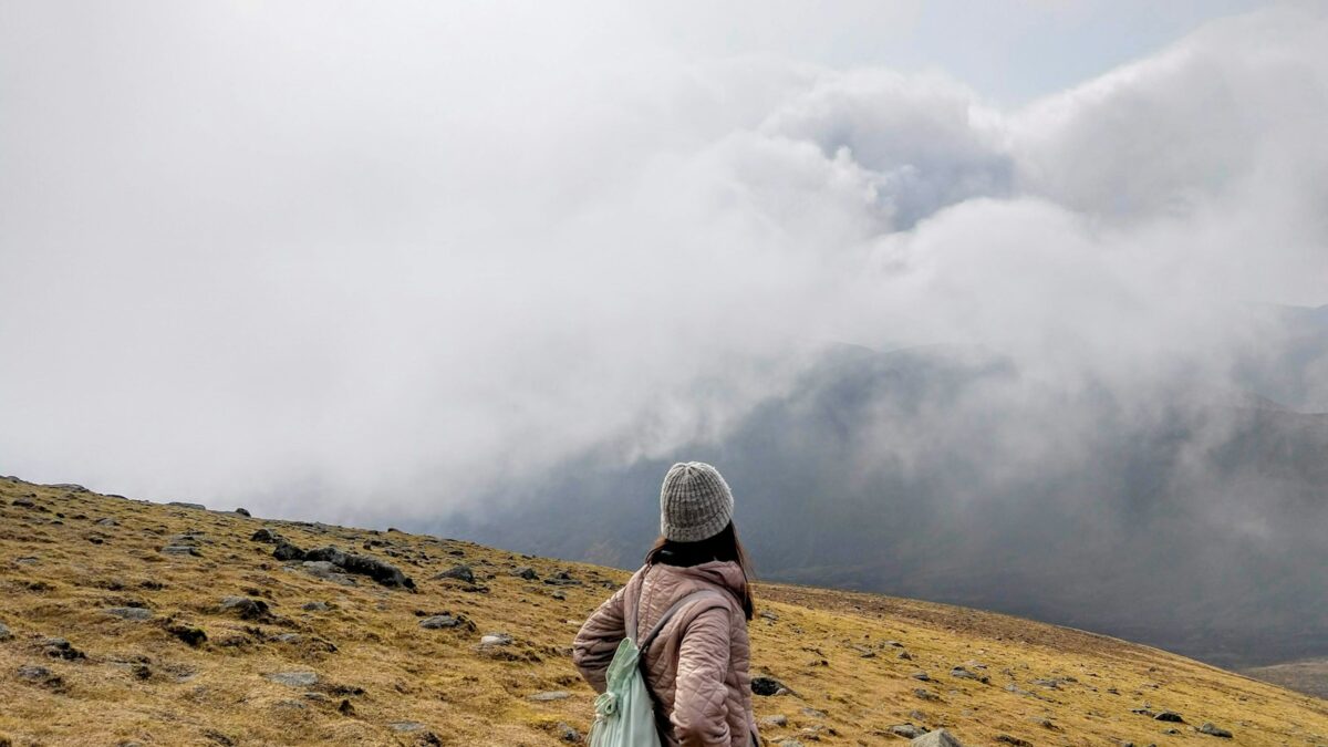 a man standing on a hill