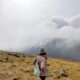 a man standing on a hill