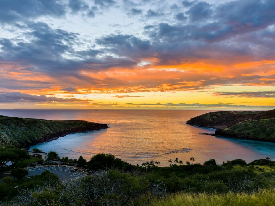 body of water during golden hour