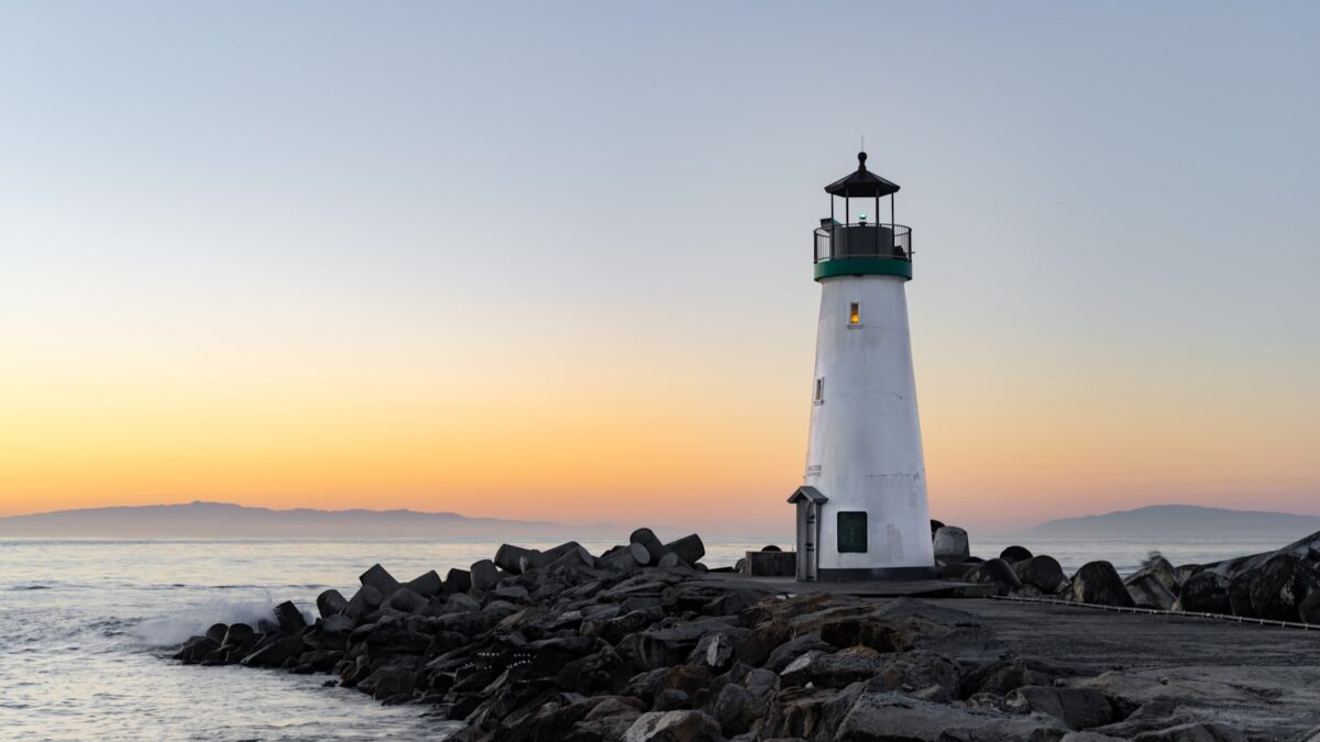 lighthouse near body of water