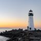 lighthouse near body of water