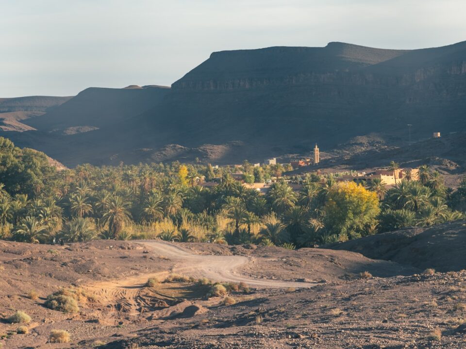 a dirt road in the middle of a mountain range