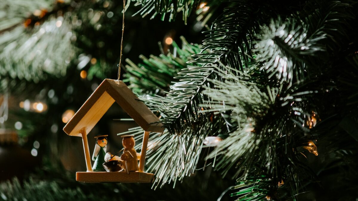 The Nativity of Christ-themed wooden Christmas ornament