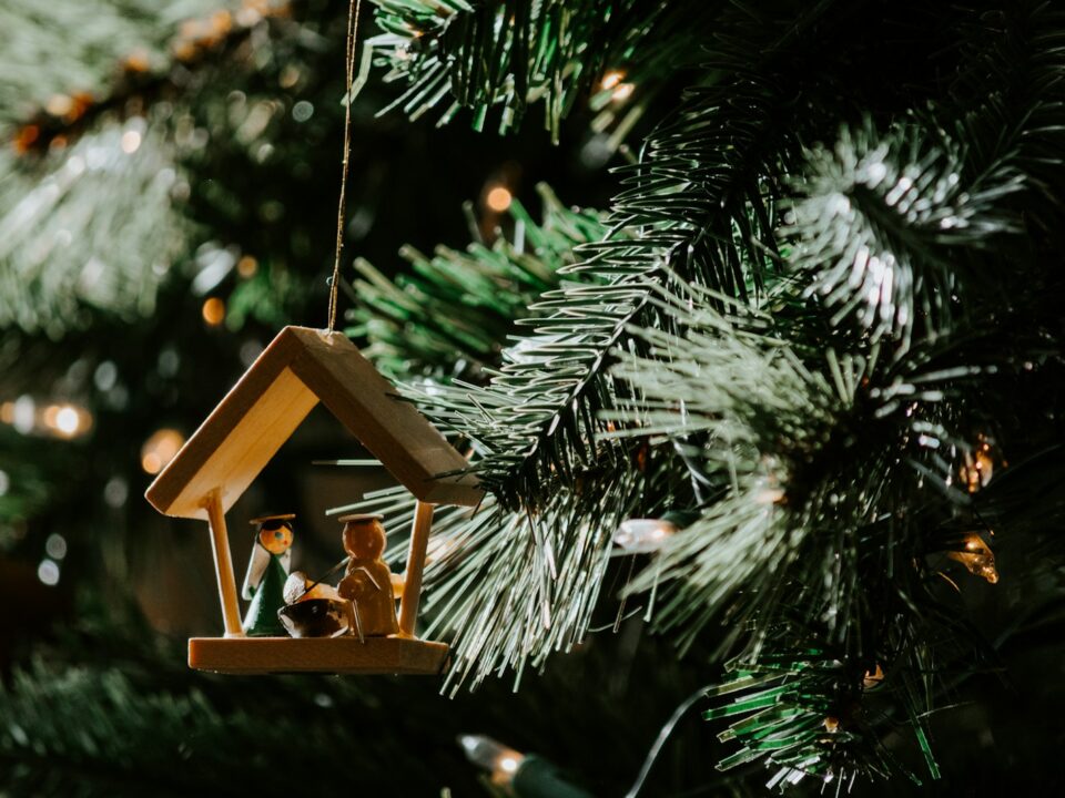 The Nativity of Christ-themed wooden Christmas ornament