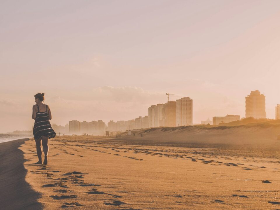 woman walking on desert sand