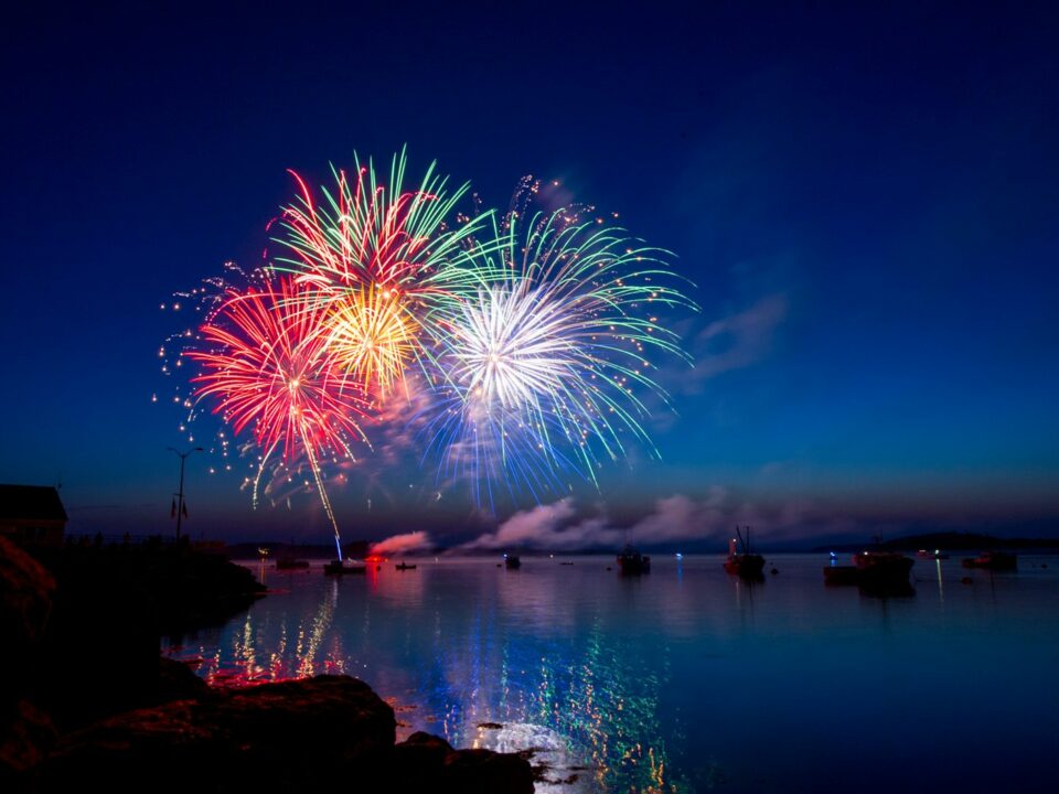 green, red, and white fireworks on sky at nighttime