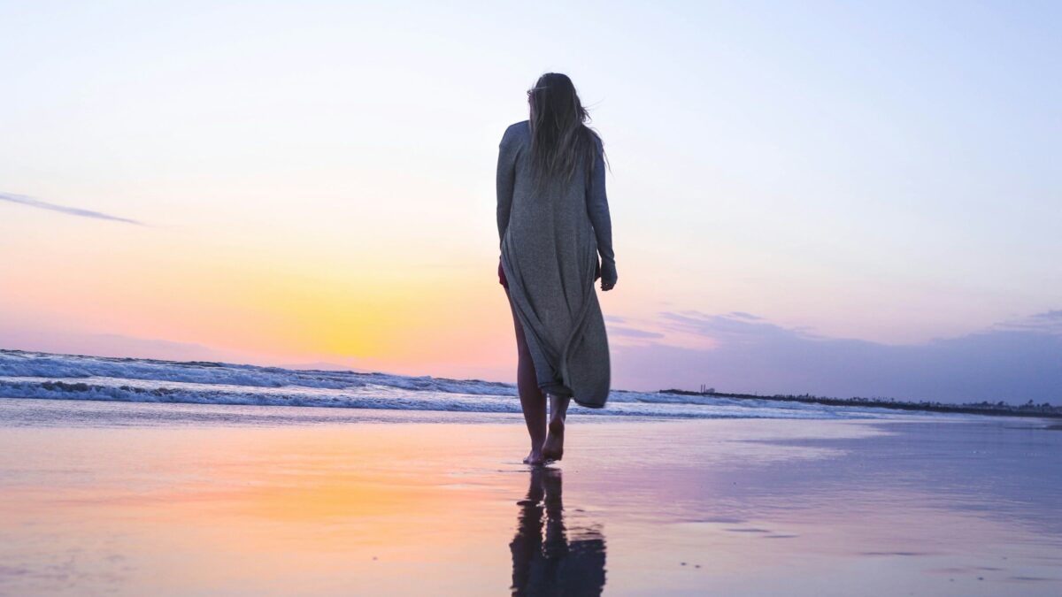 woman standing on beachfront