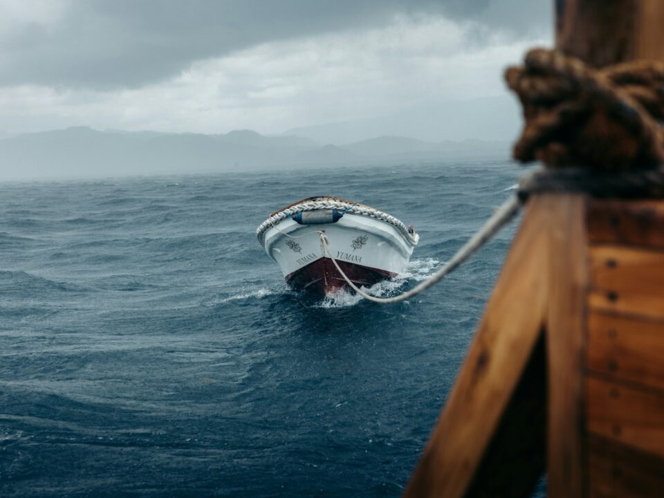 A boat in the middle of a large body of water