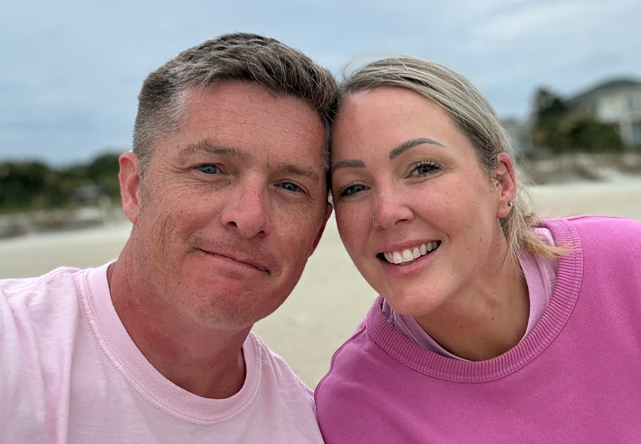 James Murray and his wife at the beach